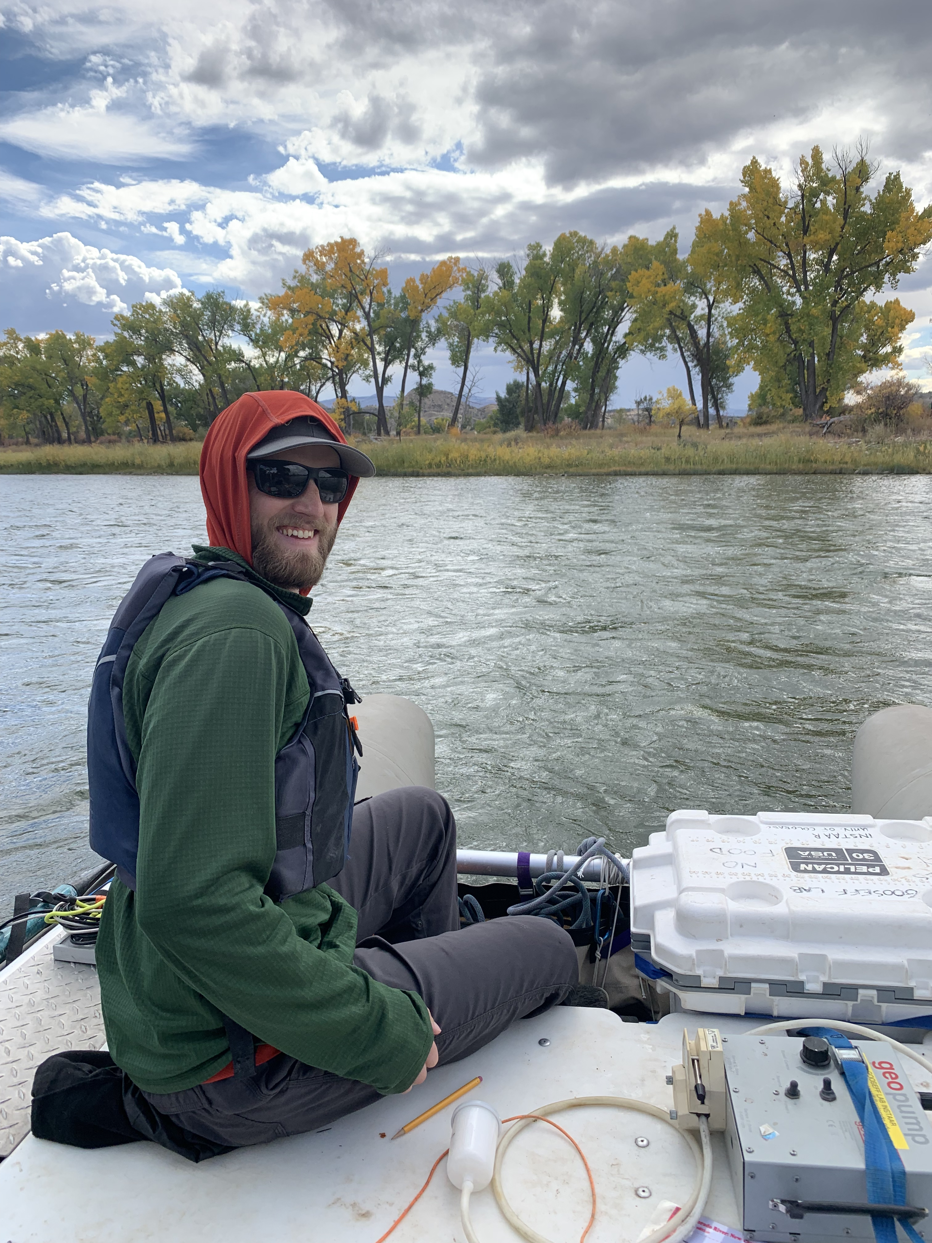 Researcher collecting water samples in the field